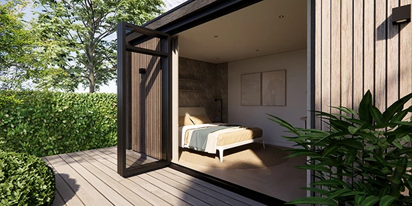 Een tuinkantoor tijdens de avonduren. De verlichting van het kantoor geeft een luxe en warme uitstraling.