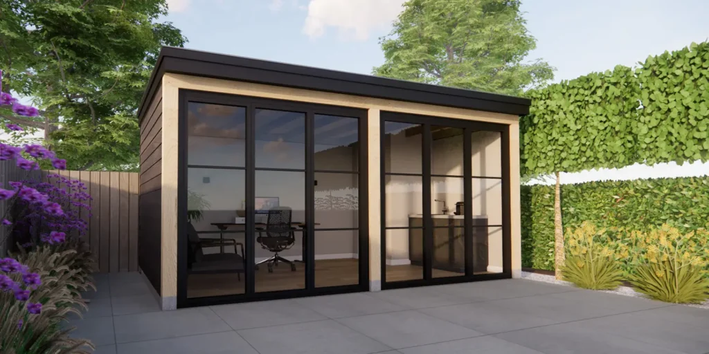 Buitenaanzicht van een ruim tuinkantoor met werkplek en keukenblok.